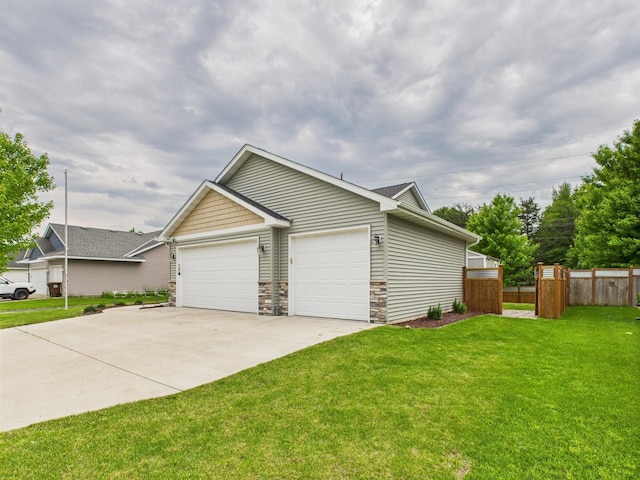 1214 Olivia St SE, New Prague, MN 56071 - view of home's exterior featuring stone siding