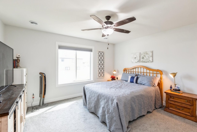 413 Fawn Run, Kenyon, MN 55946 - bedroom with carpet floors, baseboards, and a ceiling fan