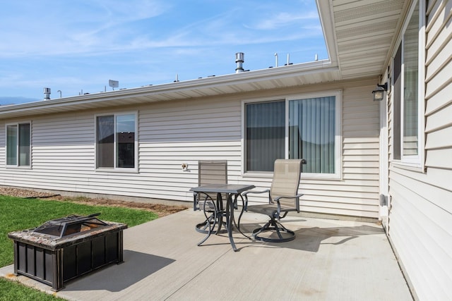 413 Fawn Run, Kenyon, MN 55946 - view of patio with an outdoor fire pit