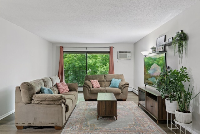 1903 Silver Bell Rd Unit 314, Eagan, MN 55122 - living area with a baseboard heating unit, wood finished floors, a wall unit AC, and a textured ceiling