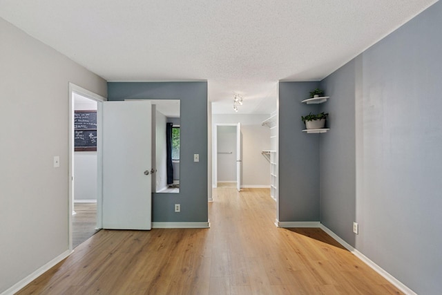 1903 Silver Bell Rd Unit 314, Eagan, MN 55122 - hall with light wood-style floors