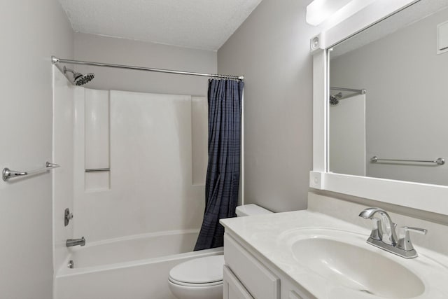 1903 Silver Bell Rd Unit 314, Eagan, MN 55122 - bathroom featuring shower / bath combo with shower curtain, a textured ceiling, and vanity