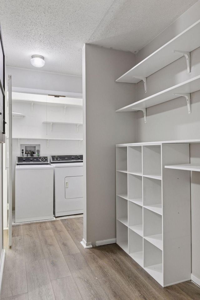 1903 Silver Bell Rd Unit 314, Eagan, MN 55122 - pantry featuring washing machine and clothes dryer