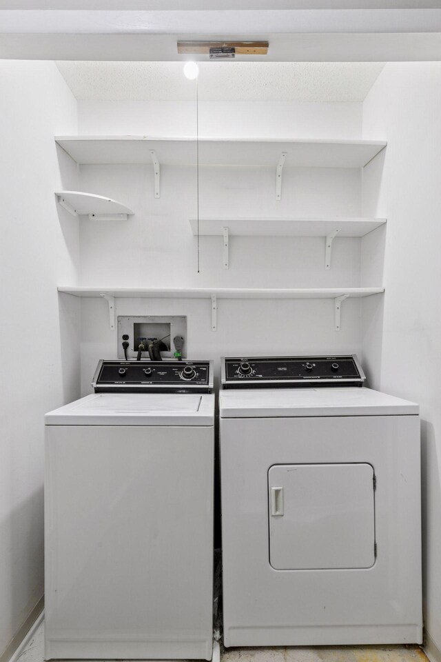 1903 Silver Bell Rd Unit 314, Eagan, MN 55122 - washroom featuring washing machine and clothes dryer