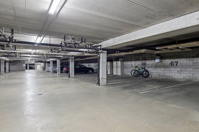 1903 Silver Bell Rd Unit 314, Eagan, MN 55122 - parking deck featuring concrete block wall