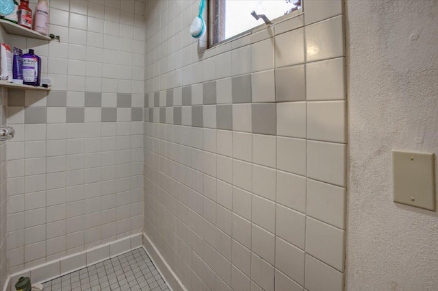 607 Cross Ave S, Amery, WI 54001 - bathroom featuring a tile shower and tile patterned floors