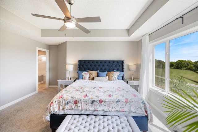 5360 Pine Island Rd, Woodbury, MN 55129 - bedroom with carpet flooring, baseboards, a ceiling fan, and connected bathroom