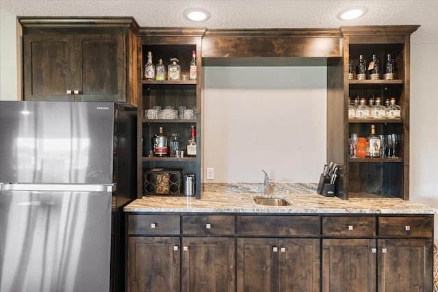 5360 Pine Island Rd, Woodbury, MN 55129 - indoor wet bar featuring freestanding refrigerator and a textured ceiling