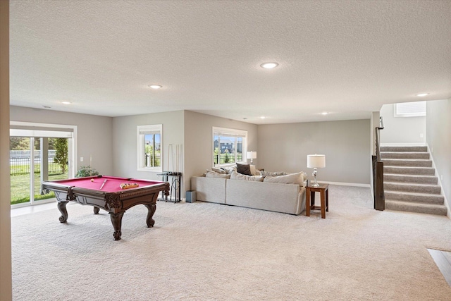 5360 Pine Island Rd, Woodbury, MN 55129 - game room featuring carpet floors, recessed lighting, pool table, healthy amount of natural light, and a textured ceiling
