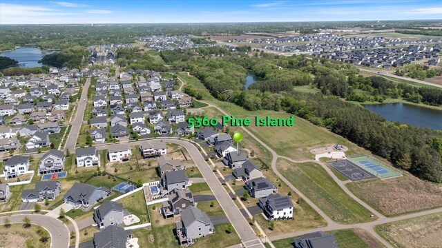 5360 Pine Island Rd, Woodbury, MN 55129 - aerial view of property and surrounding area with a nearby body of water and nearby suburban area
