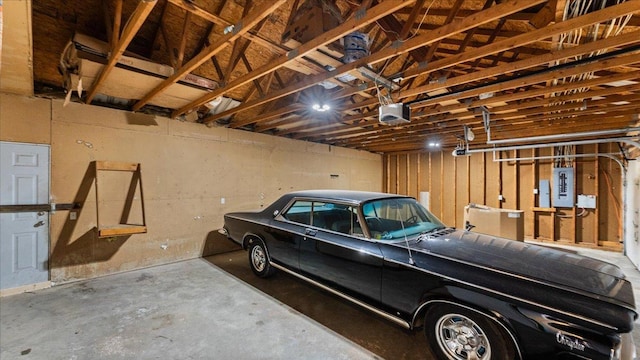 28306 State Highway 25, Belle Plaine, MN 56011 - garage featuring electric panel and a garage door opener
