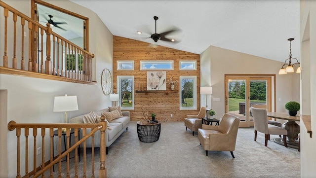 28306 State Highway 25, Belle Plaine, MN 56011 - living room featuring high vaulted ceiling, ceiling fan, carpet, and wood walls