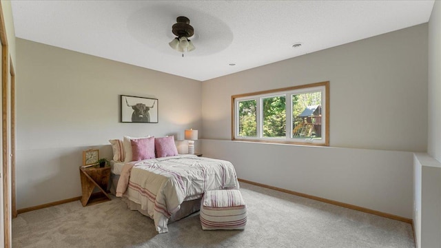28306 State Highway 25, Belle Plaine, MN 56011 - carpeted bedroom with baseboards and ceiling fan