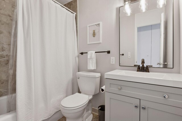 15 1st St Unit A1009, Minneapolis, MN 55401 - full bathroom featuring shower / bath combo with shower curtain, vanity, and toilet