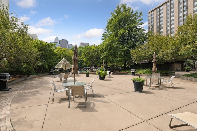 15 1st St Unit A1009, Minneapolis, MN 55401 - surrounding community featuring outdoor dining area and a patio