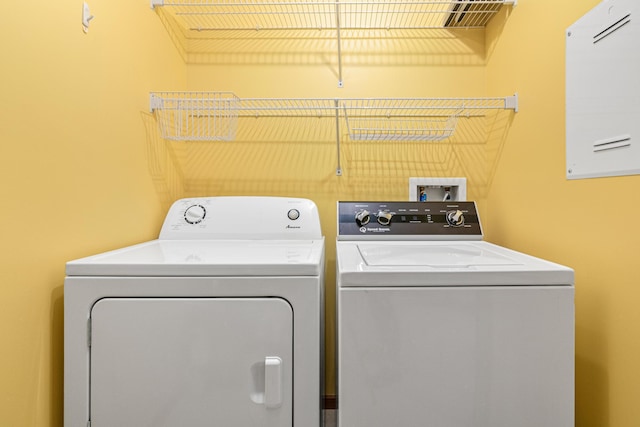 washroom featuring washer and dryer and laundry area