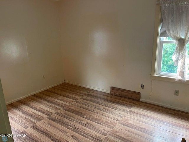 empty room with baseboards