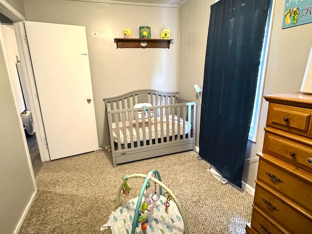 109 Rocket Dr, Badger, MN 56714 - carpeted bedroom with a nursery area