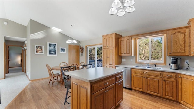 9112 Indigo Rd NW, Watab Twp, MN 56367 - kitchen with stainless steel dishwasher, lofted ceiling, a chandelier, and a sink