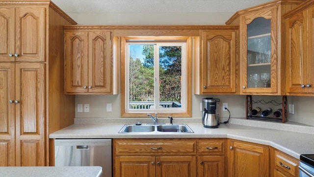 9112 Indigo Rd NW, Watab Twp, MN 56367 - kitchen with glass insert cabinets, dishwasher, light countertops, and a sink