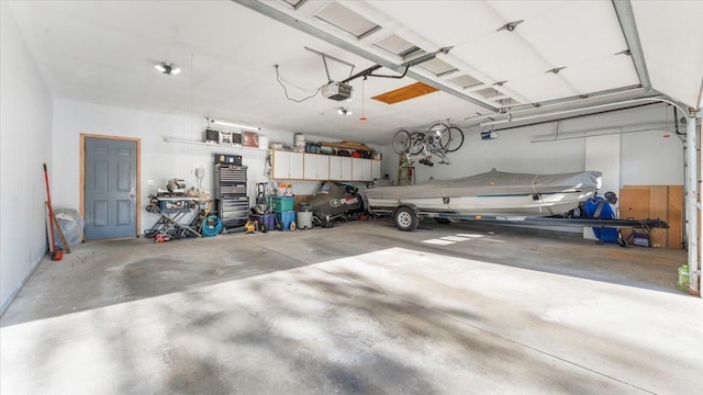 9112 Indigo Rd NW, Watab Twp, MN 56367 - garage featuring a garage door opener