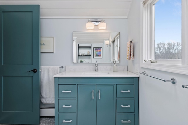 bathroom featuring vanity and a baseboard heating unit