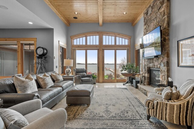 623 Shore Dr, Forest Lake, MN 55025 - living area featuring a fireplace, beamed ceiling, high vaulted ceiling, recessed lighting, and wood ceiling