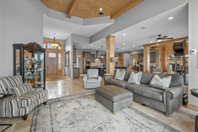 623 Shore Dr, Forest Lake, MN 55025 - living area featuring ceiling fan, stone tile floors, recessed lighting, wooden ceiling, and ornate columns