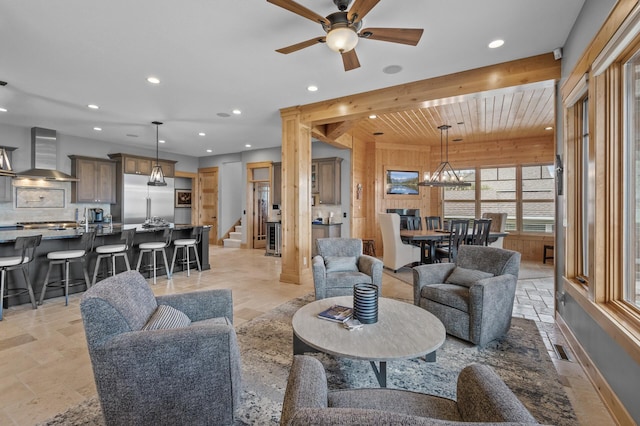 623 Shore Dr, Forest Lake, MN 55025 - living area with recessed lighting, stone tile floors, baseboards, and ceiling fan