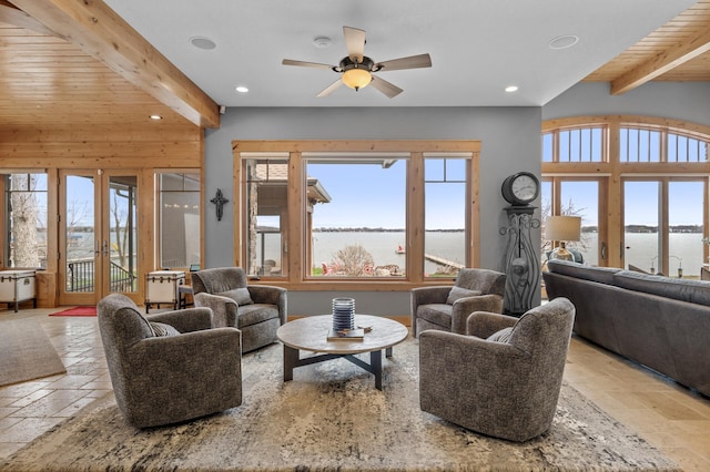 623 Shore Dr, Forest Lake, MN 55025 - living area featuring french doors, stone tile floors, beam ceiling, and recessed lighting
