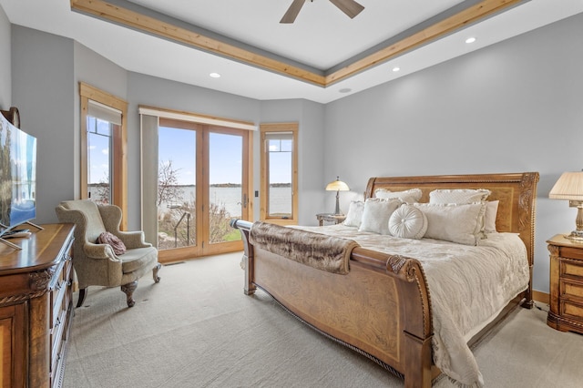623 Shore Dr, Forest Lake, MN 55025 - bedroom with a raised ceiling, access to outside, recessed lighting, and light colored carpet