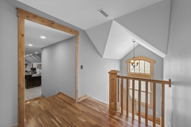 623 Shore Dr, Forest Lake, MN 55025 - bonus room with a notable chandelier, recessed lighting, wood finished floors, and visible vents