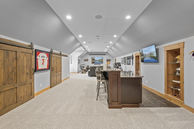 623 Shore Dr, Forest Lake, MN 55025 - bar featuring a barn door, dark colored carpet, recessed lighting, baseboards, and vaulted ceiling