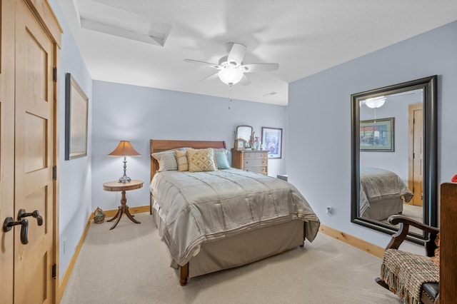 623 Shore Dr, Forest Lake, MN 55025 - bedroom with baseboards, ceiling fan, and light carpet