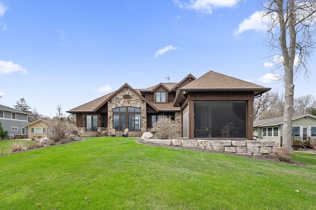 623 Shore Dr, Forest Lake, MN 55025 - rear view of house with a yard and stone siding
