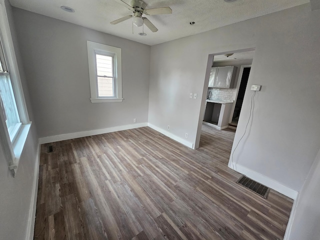 4517 4th Ave S, Minneapolis, MN 55419 - empty room with a ceiling fan and wood finished floors
