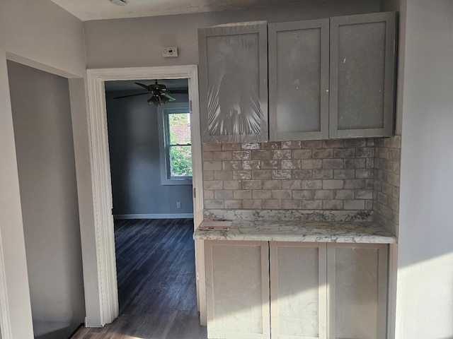 4517 4th Ave S, Minneapolis, MN 55419 - kitchen with tasteful backsplash, dark wood finished floors, light countertops, ceiling fan, and gray cabinetry