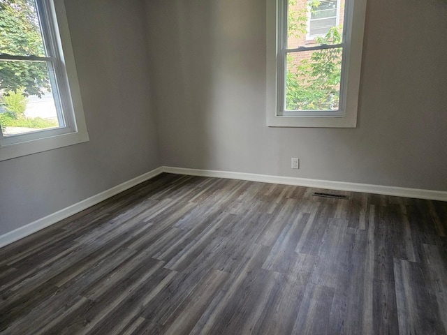 4517 4th Ave S, Minneapolis, MN 55419 - spare room featuring baseboards and dark wood finished floors