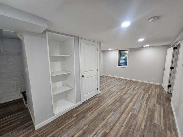 4517 4th Ave S, Minneapolis, MN 55419 - below grade area featuring wood finished floors, built in features, and recessed lighting