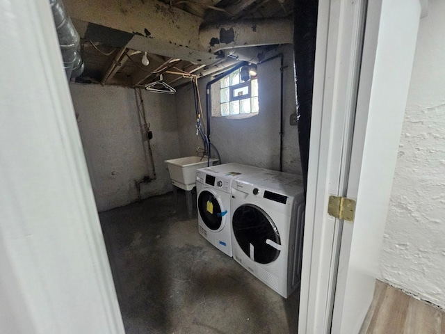 4517 4th Ave S, Minneapolis, MN 55419 - laundry room featuring independent washer and dryer and a textured wall