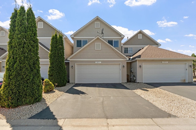 12172 Waconia St NE Unit C, Blaine, MN 55449 - view of front of property featuring driveway and an attached garage