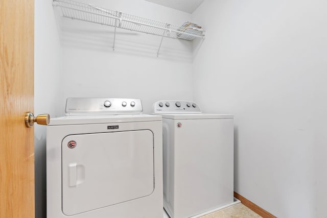 12172 Waconia St NE Unit C, Blaine, MN 55449 - laundry room with independent washer and dryer and baseboards