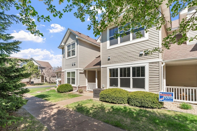 12172 Waconia St NE Unit C, Blaine, MN 55449 - view of front of property with a front lawn