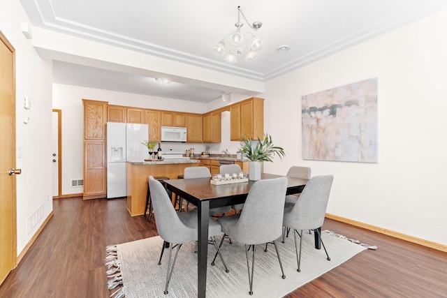 12172 Waconia St NE Unit C, Blaine, MN 55449 - dining space featuring baseboards, dark wood-type flooring, and a chandelier