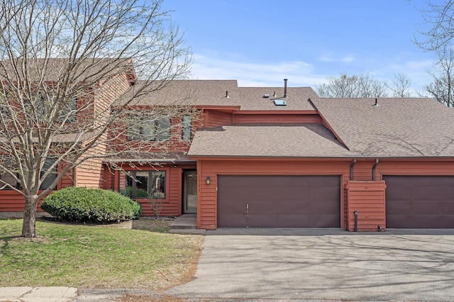 10695 53rd Ave N, Plymouth, MN 55442 - multi unit property featuring roof with shingles, a front lawn, driveway, and an attached garage