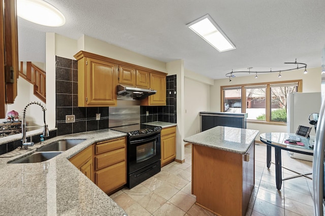 10695 53rd Ave N, Plymouth, MN 55442 - kitchen with black range with electric cooktop, a sink, a center island, tasteful backsplash, and light stone countertops