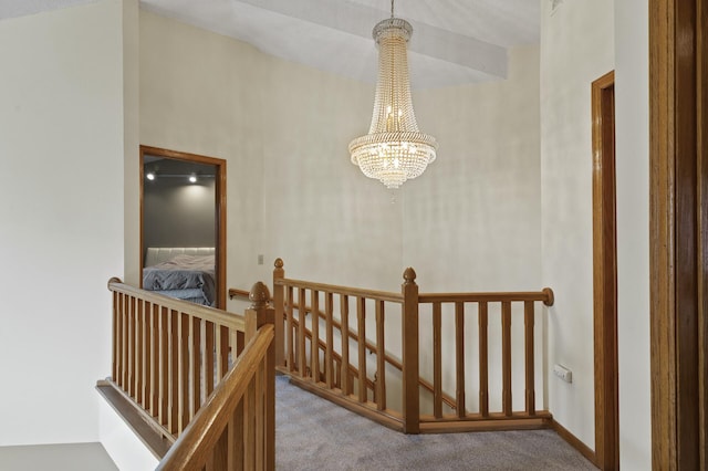 10695 53rd Ave N, Plymouth, MN 55442 - hallway with an upstairs landing, carpet flooring, and a chandelier