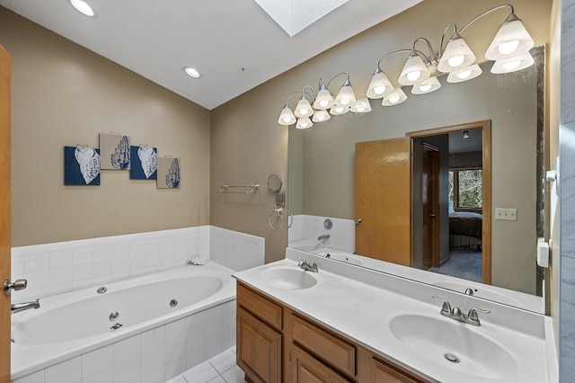 10695 53rd Ave N, Plymouth, MN 55442 - ensuite bathroom with a jetted tub, double vanity, and a skylight