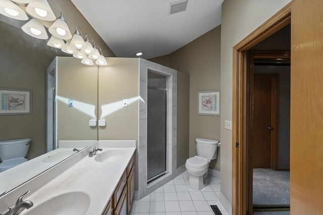 10695 53rd Ave N, Plymouth, MN 55442 - full bath featuring toilet, double vanity, and a stall shower