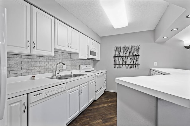 10411 Cedar Lake Rd Unit 301, Minnetonka, MN 55305 - kitchen with white cabinets, a sink, light countertops, white appliances, and backsplash